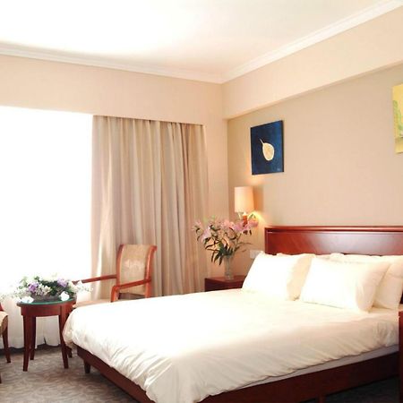 Greentree Inn Shanghai Dongming Road Subway Station Express Hotel Exterior photo